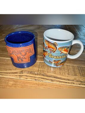 2 Branson, MO souvenir mugs - 1 is a pottery piece & other 1 is a rainbow trout